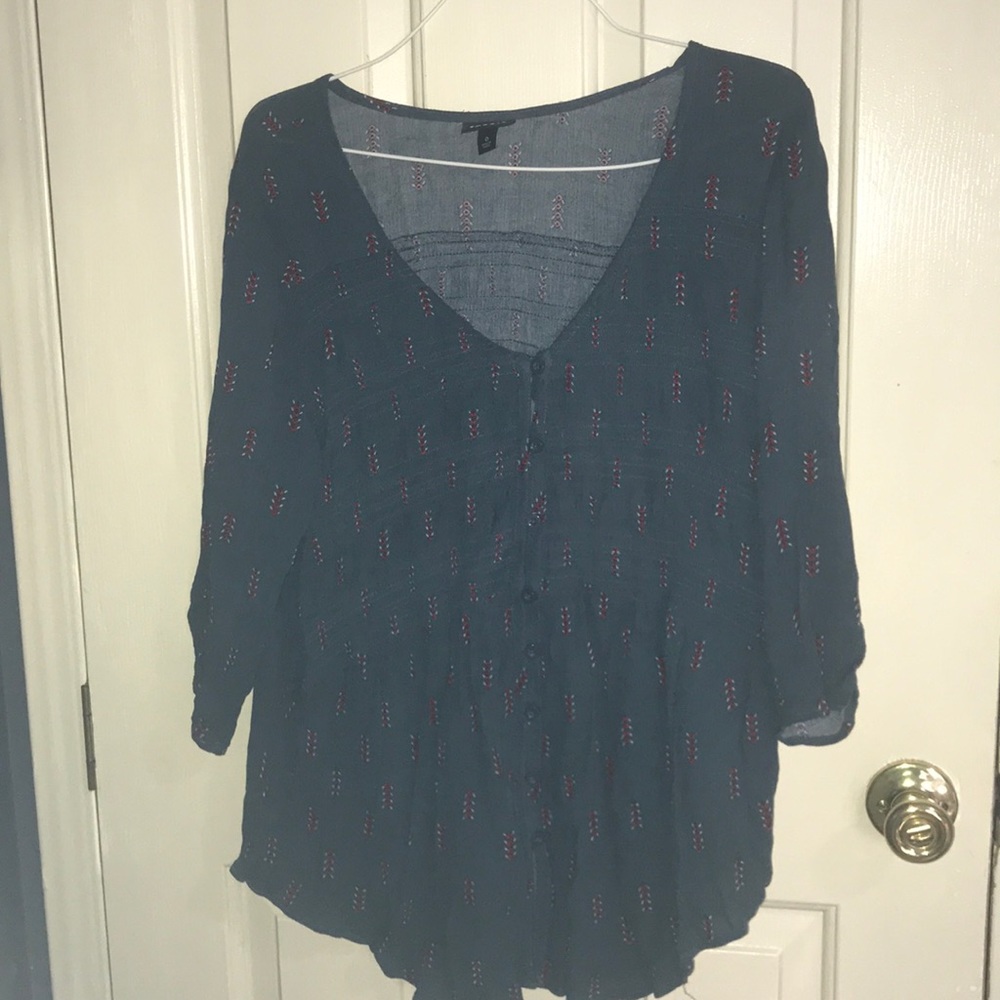 Blue blouse with red detail